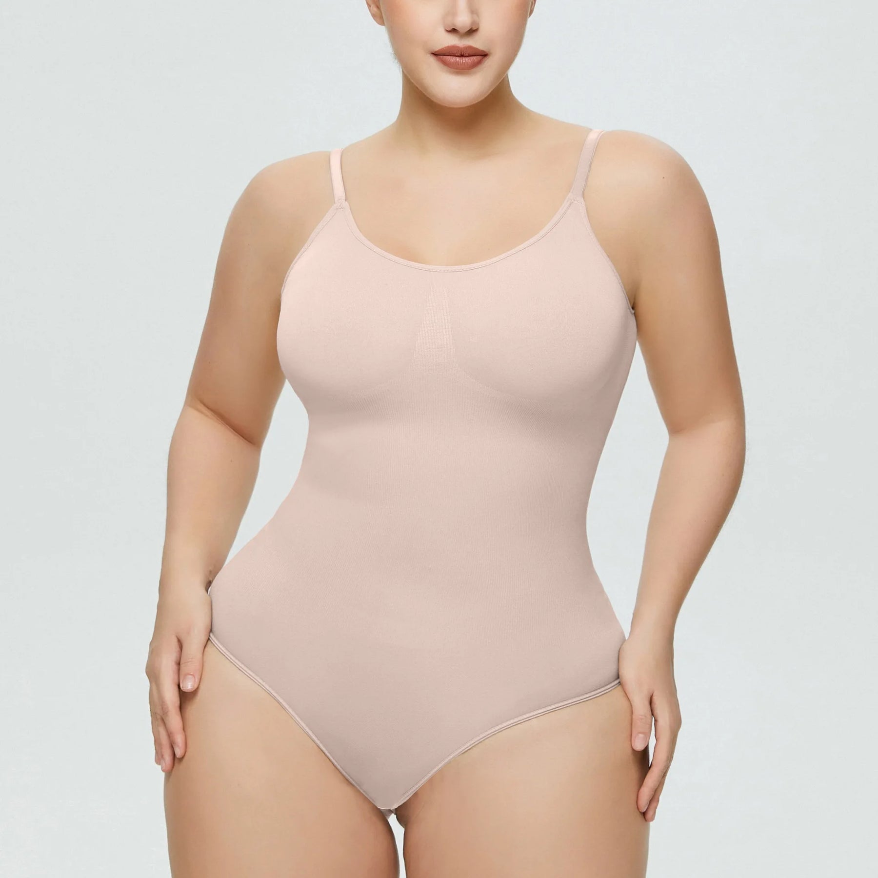 Michelle's Embrace: Unleash Your Curves with our Seamless Bodysuit featuring an Open Bust—Your Secret to Sensational Confidence!