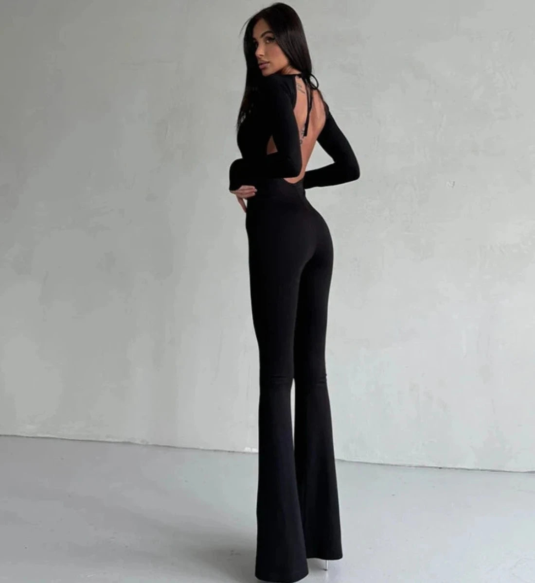 Riley - Alluring  backless jumpsuit featuring stylish straps