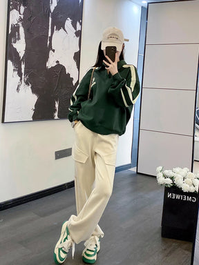 Ensemble décontracté de Megan : polo vert à col long et pantalon large amincissant - Style élégant et jeunesse assurée !"